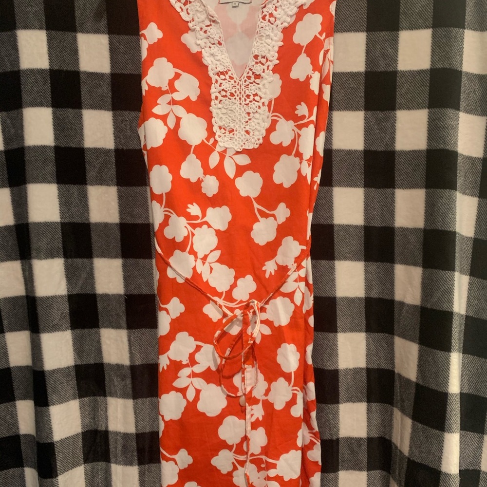 Mud Pie floral dress with lace trim on hem.